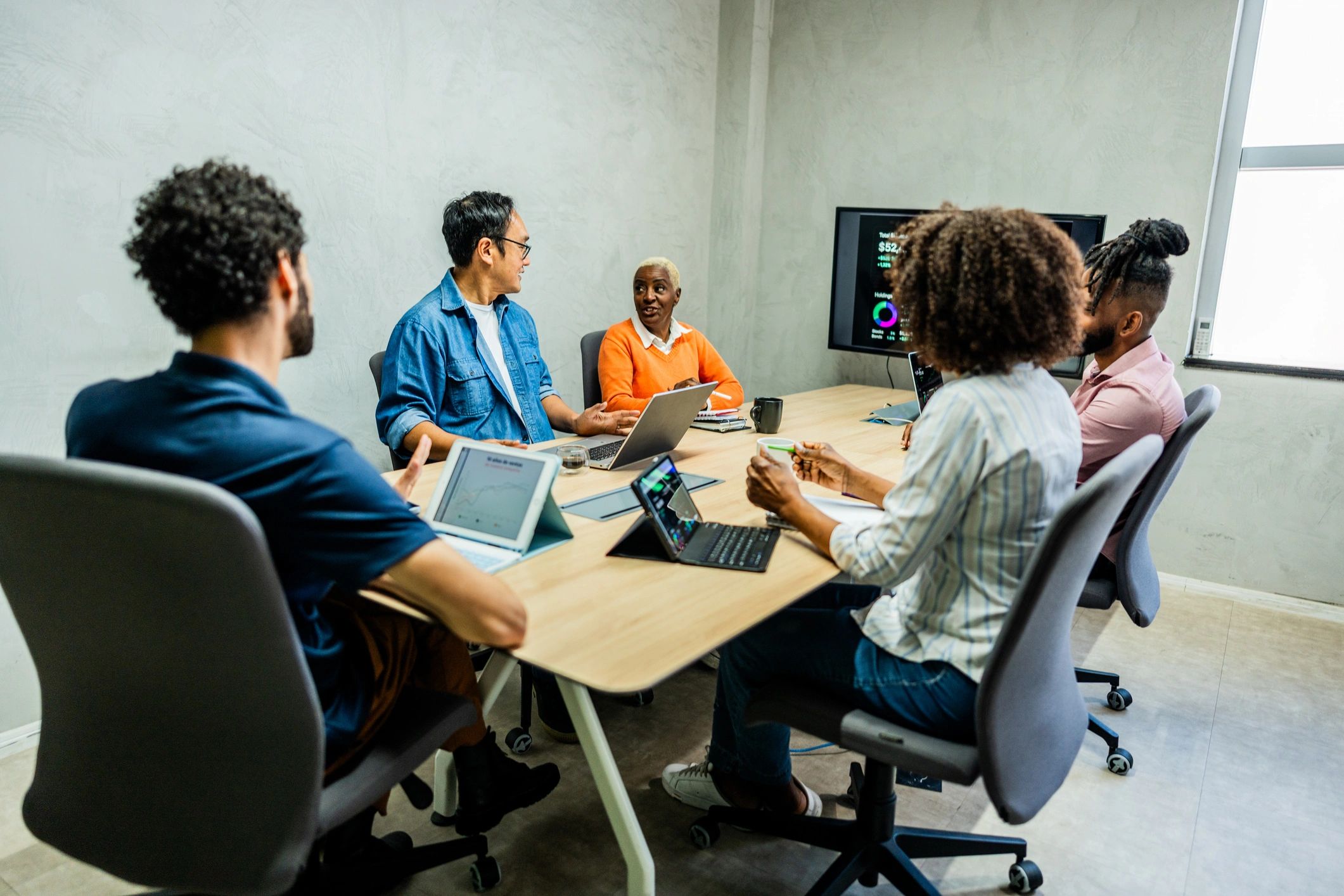 Professional in a meeting representing enterprise leadership